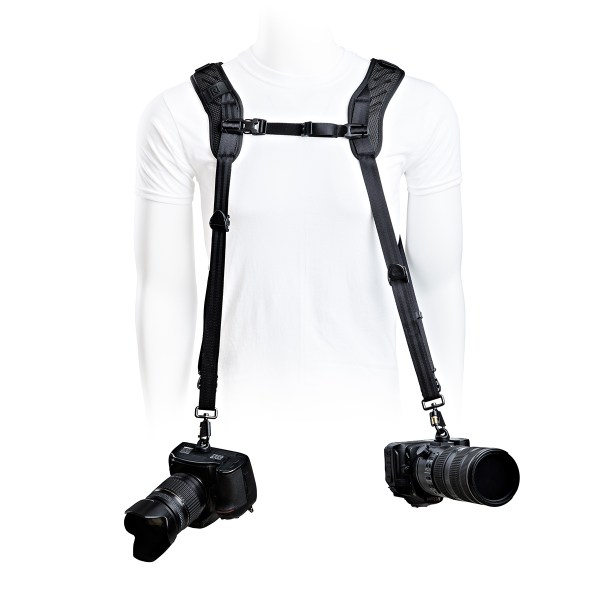 BlackRapid shoulder strap worn across the chest with camera hanging at the hip, ready for use.