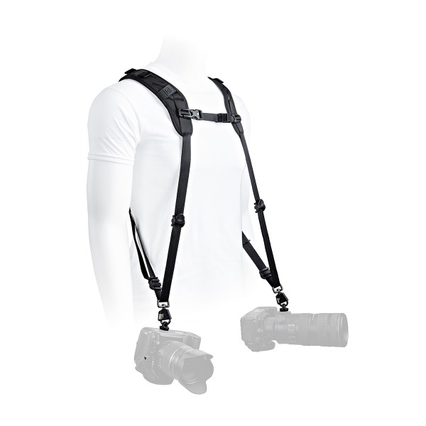 BlackRapid shoulder strap worn across the chest with camera hanging at the hip, ready for use.