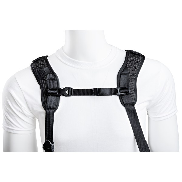 BlackRapid shoulder strap worn across the chest with camera hanging at the hip, ready for use.
