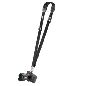 Camera strap with a camera attached, featuring a non-slip shoulder pad, ideal for outdoor photographers on the go.