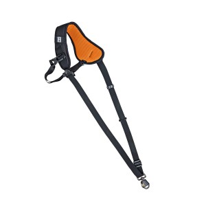 A black and orange harness featuring a strap, designed for secure and comfortable use.